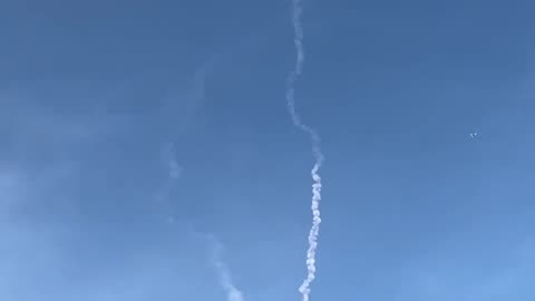 Rockets streak across the sky in Israel.