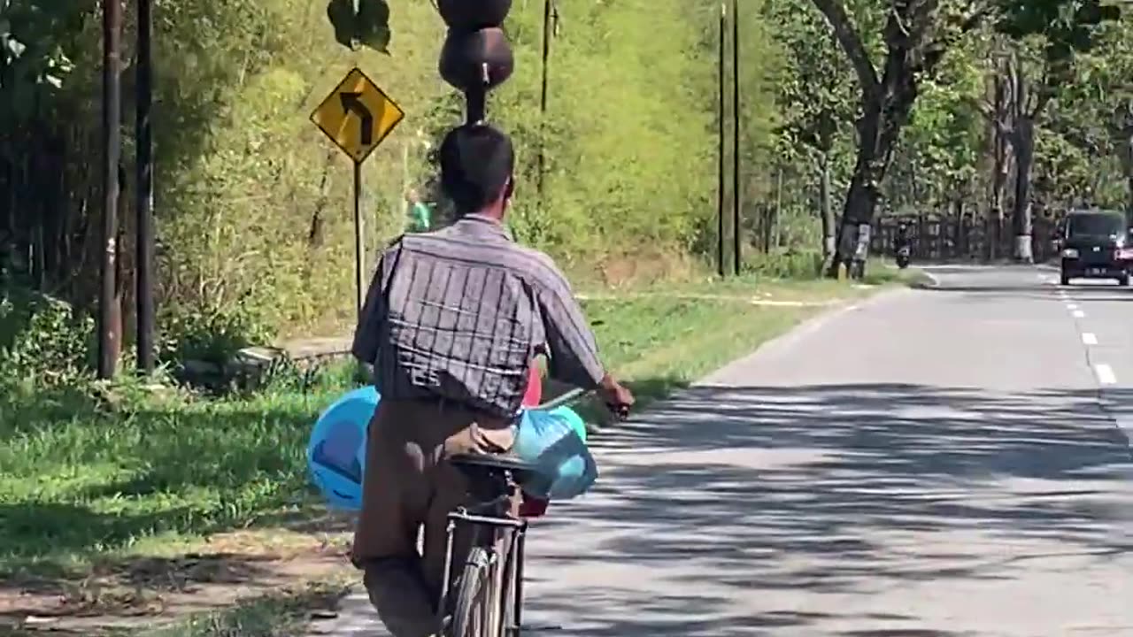 Bike Rider's One-Sided Balancing Act