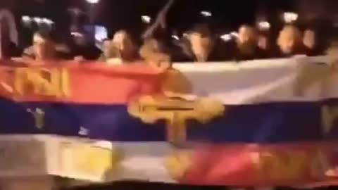 Montenegrins march under the Katyusha with a banner "Serbs in Montenegro - Russians in Ukraine" and