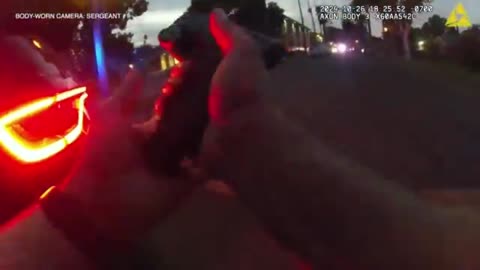 Fresno PD officer struck twice in drive by continue to fight suspect until threat is over