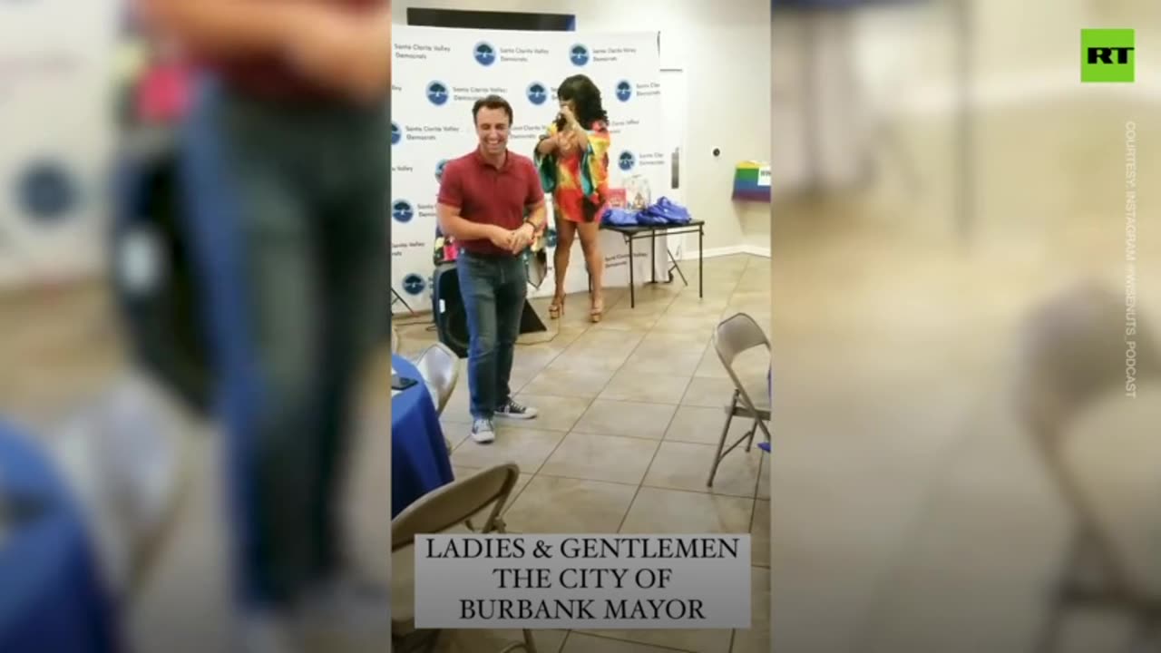 California Mayor gets spanked by drag queen in front of children.