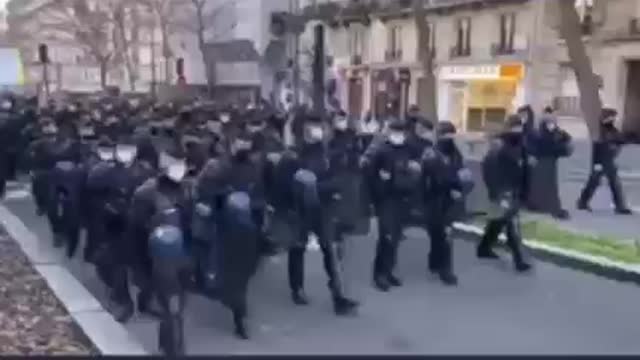 French Police March With Protesters