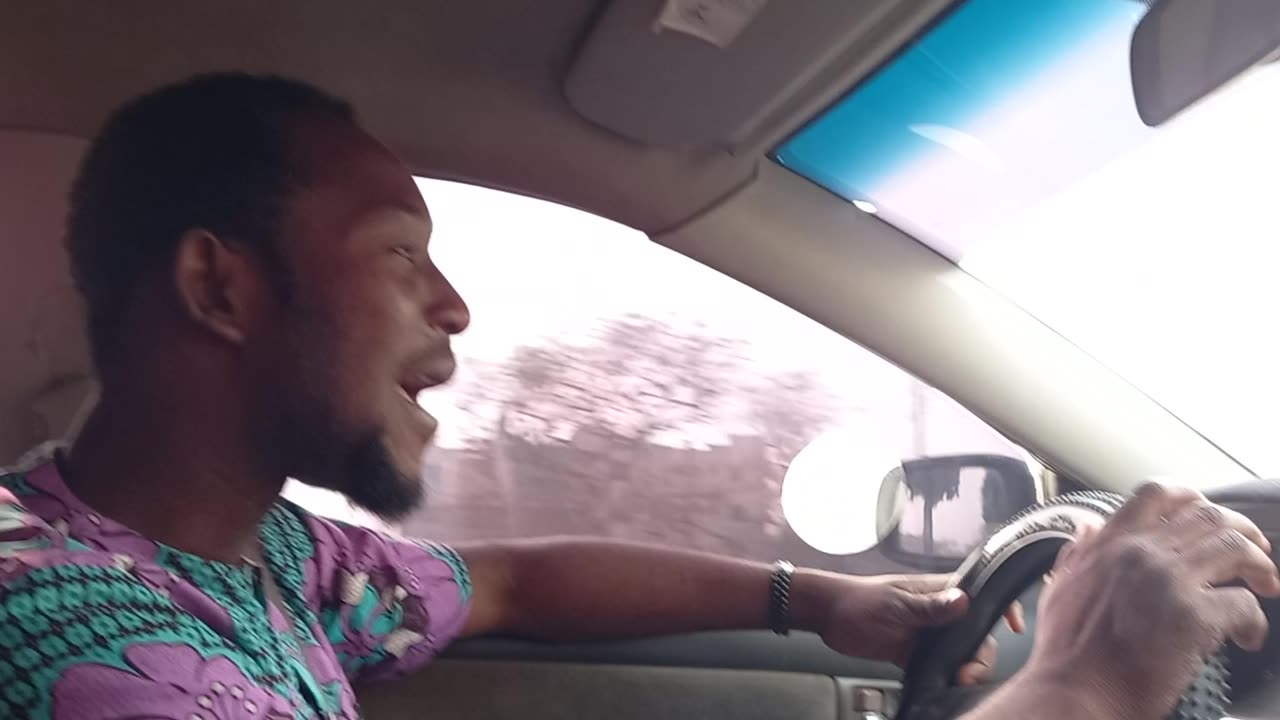 my First in Abuja with my drivers George