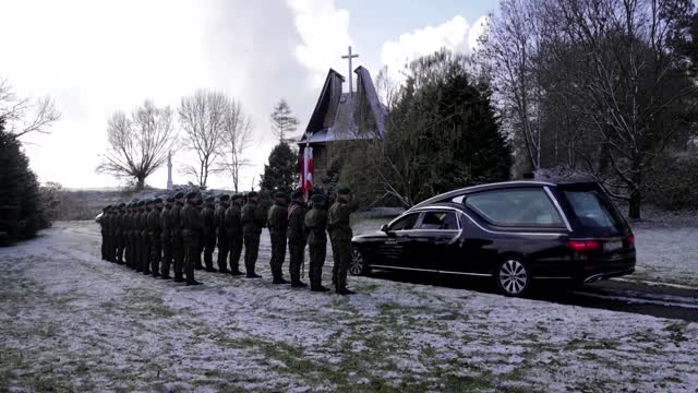 Funeral held for man killed by missile in Poland