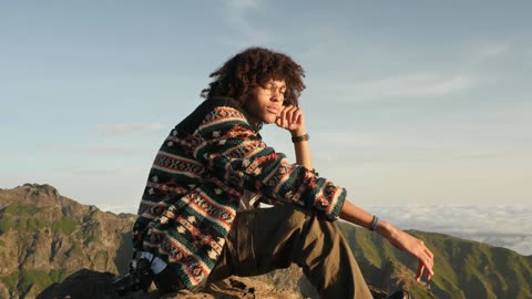 Rasta Man chilling on top of the mountain