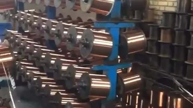 Wire and cable weaving stage in Kaman cable factory