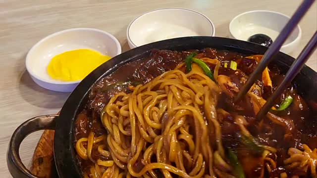 Hot stone sea food Jjajang noodle at chinese restraunt Korean style 돌판해물 짜장면