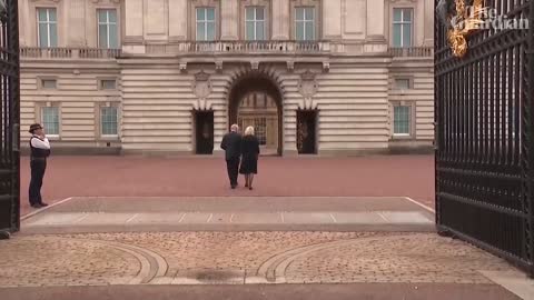 King Charles III greets crowds outside Buckingham Palace