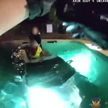 Phoenix PD Officer Saves Man from Drowning in Submerged Car.