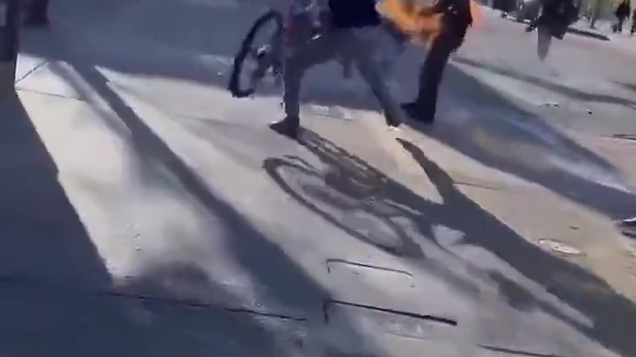 Crowd Attempts To Help Man On Fire
