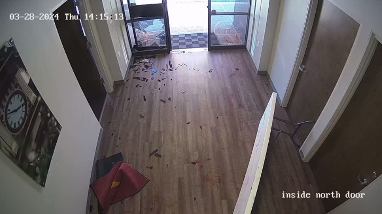 Deer leaps through bank window in Texas