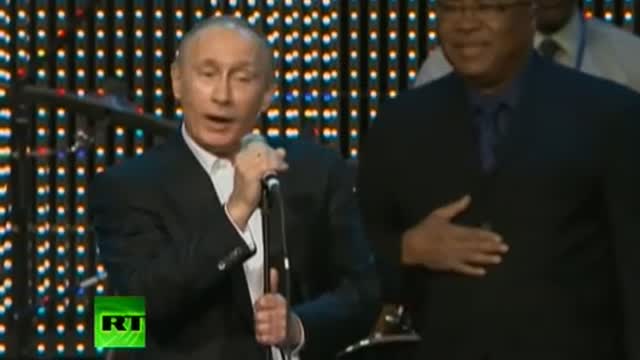 Singing PM: 'Fats' Putin over the top of 'Blueberry Hill' with piano solo