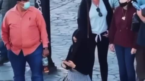 A social experiment in which a man photographs a girl under a skirt.