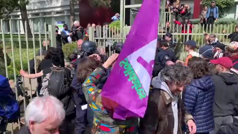 French protesters storm a medical centre which is being visited by the health minister.