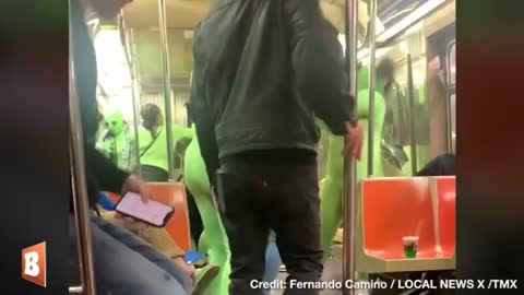 Women in Neon Green Leotards Attack, Rob NYC Subway Riders