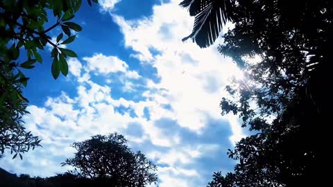 the beautiful scenery of moving clouds during the day blue sky background video