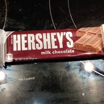 Eating Hershey's Milk Chocolate, Dbn, MI, 8/14/23