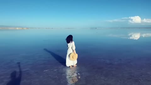 The great ocean stretches away to meet the sky