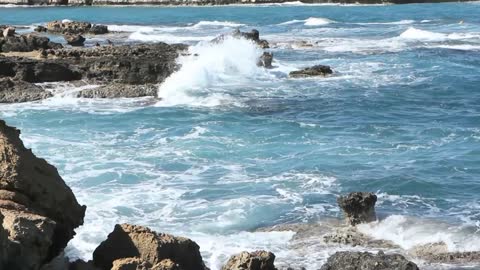 Huge waves lapping on the shoreline