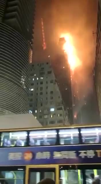 NOW - Skyscraper under construction on fire in Hong Kong.