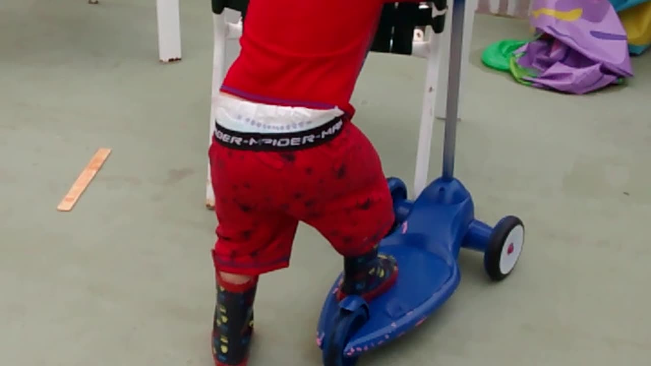 baby on scooter
