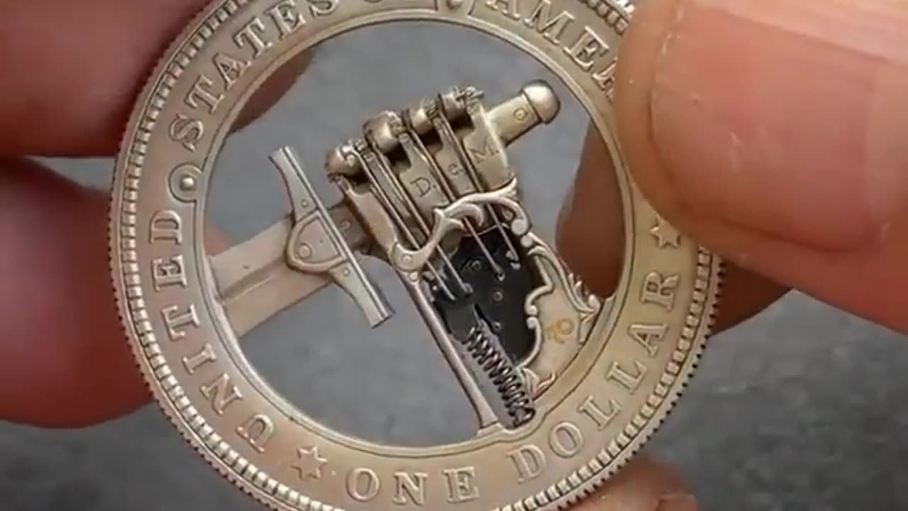 dollar coin secret mechanism unclench sword