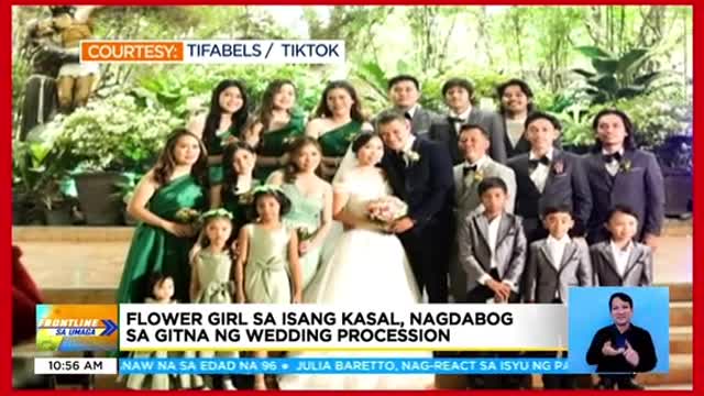 Flower girl sa isang kasal, nagdabog sa gitna ngwedding procession의