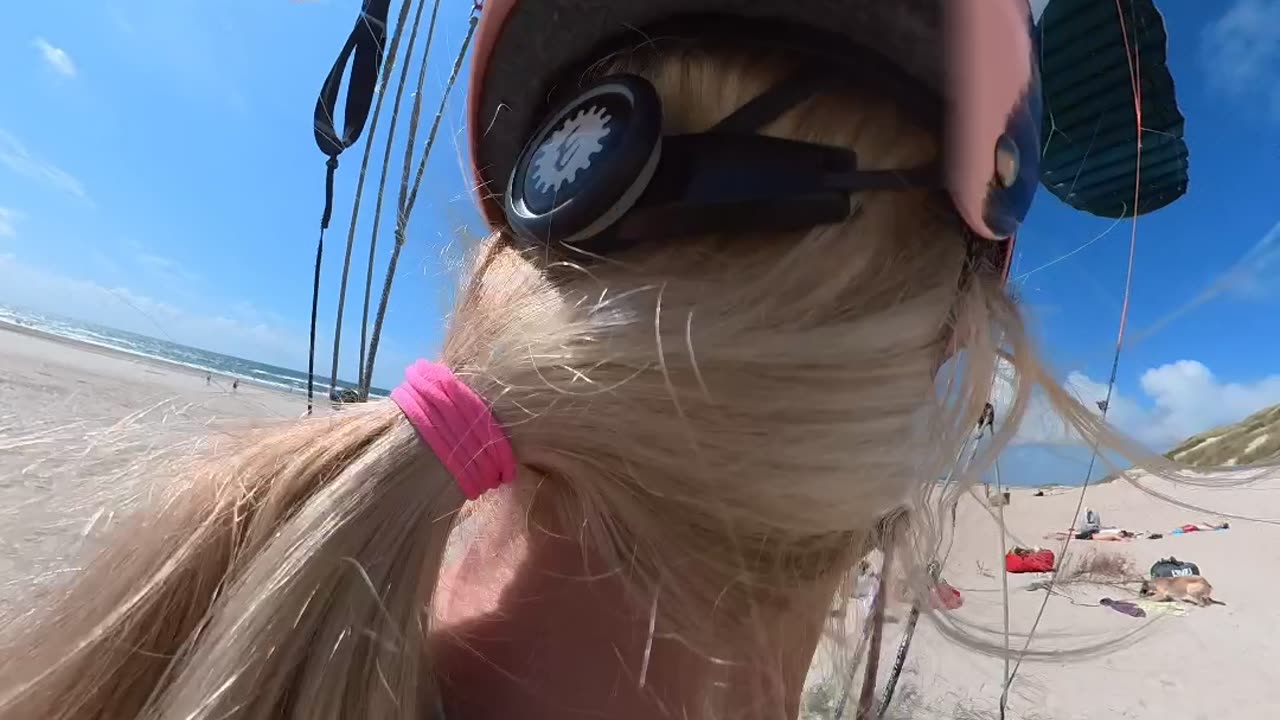 Pooch Runs Alongside Paraglider