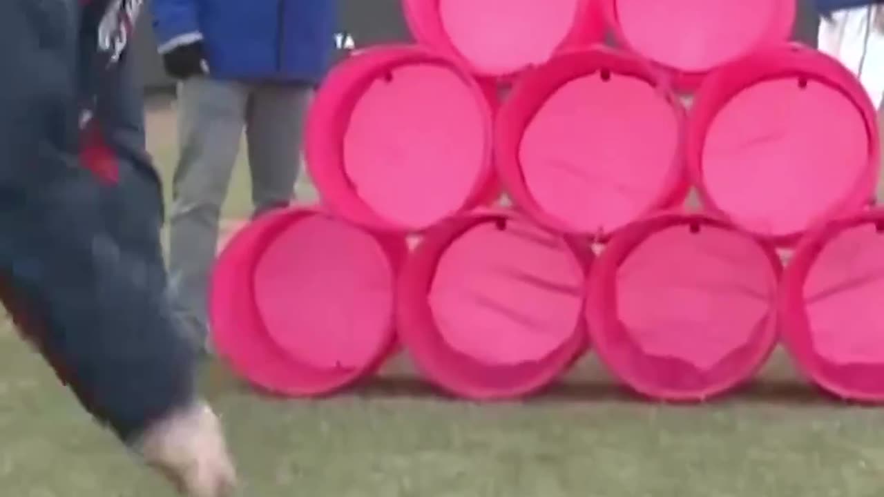 golfer hits ball and gets 2 of his mates instead