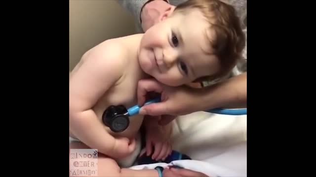 Sweet Baby Boy Rests Head On Nurse's Hand