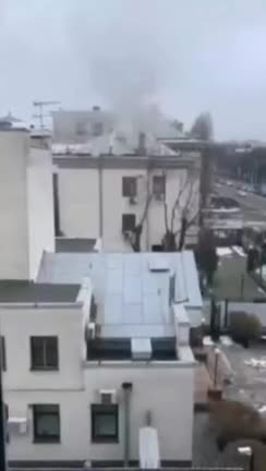Smoke rises over the Russian Embassy in Kiev