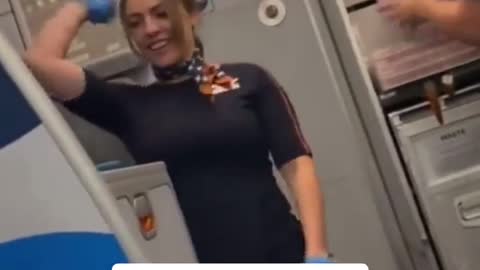 JetBlue flight attendants celebrate the removal of the mask mandate.