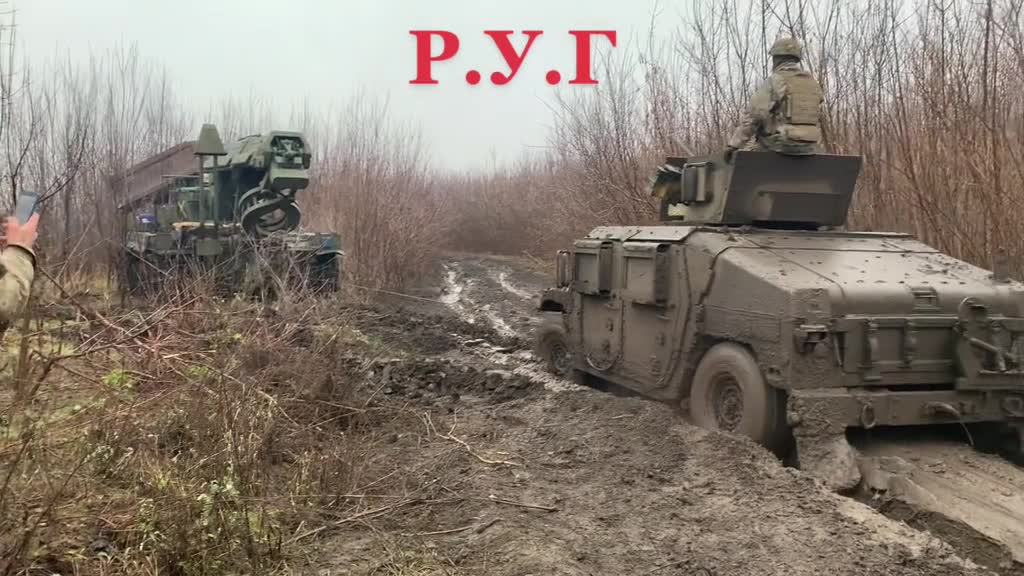 Donbass. Another American Humvee stuck in the mud.