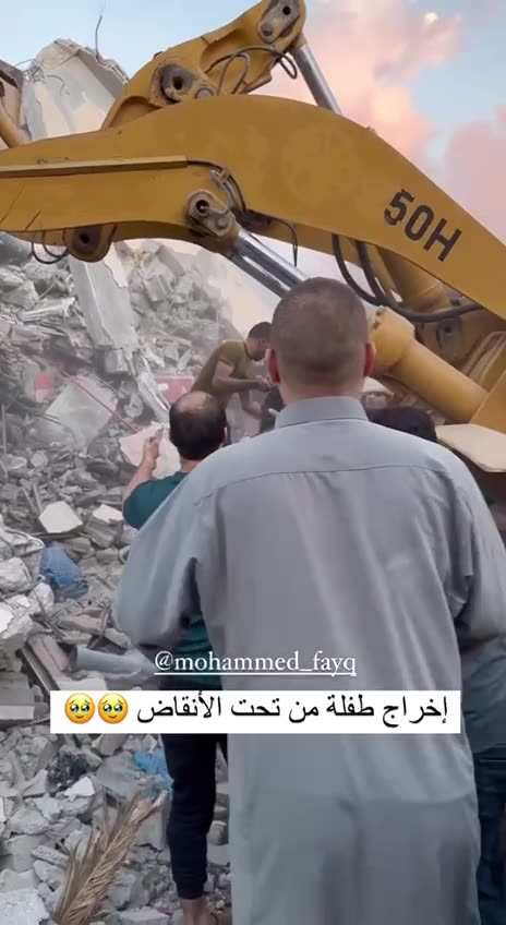 Palestinians pull civilians and children trapped under rubble from Israeli bombing campaign.