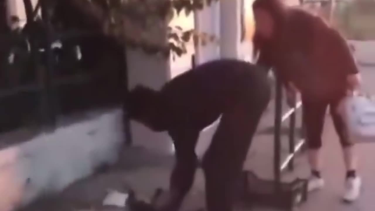 Italian Women Finds Illegal Immigrant Cooking his Cat the Streets