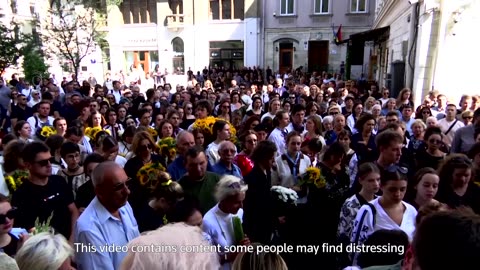 Funeral held for Ukraine family killed in strike as US announces more aid