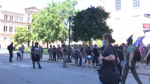 Armed militia, Black Lives Matter protesters collide in Louisville marches