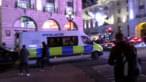 Police go Mob Handed at Assange Protest - Piccadilly Circus.