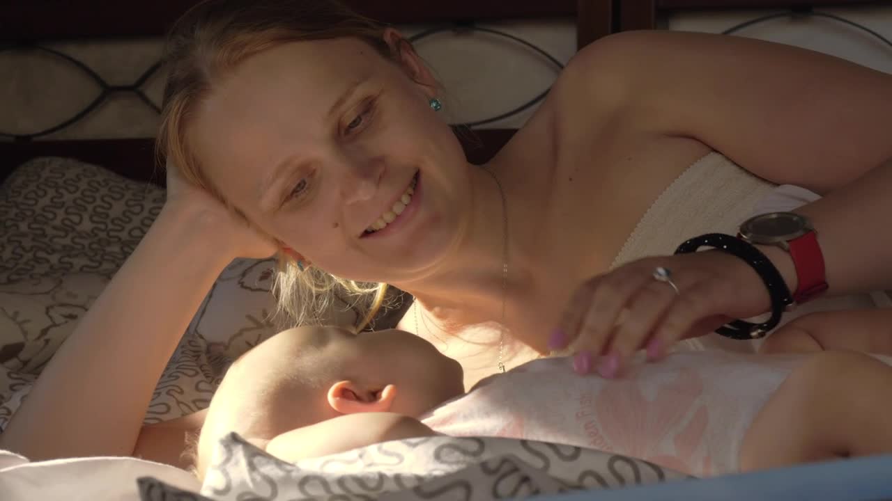 Mother and baby in a hotel room