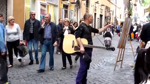 Street guitar player in Rome