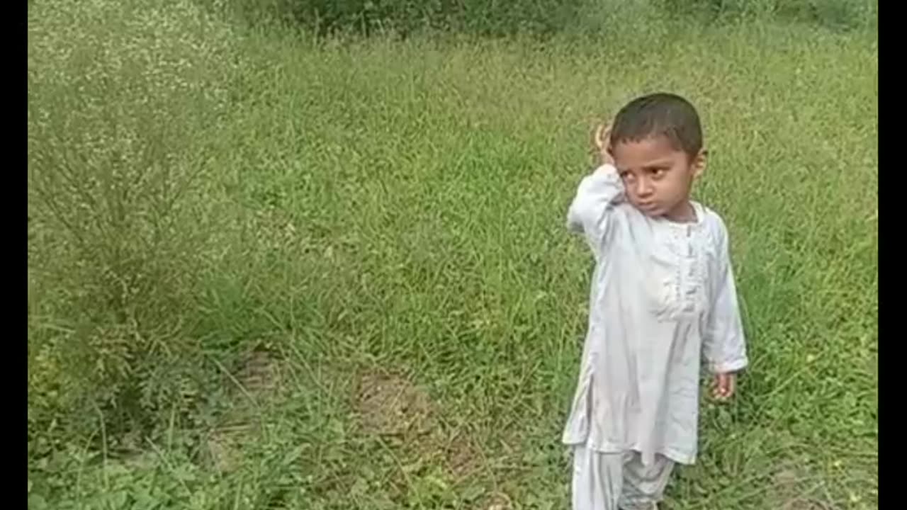 Muhammad usaid cute baby playing in mangoes garden