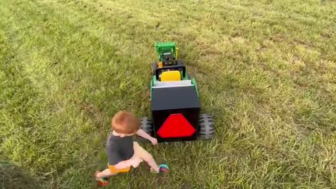 Baling_hay_with_kids_power