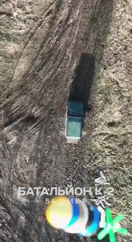 (Insane) Ukrainian Drone Drops Grenade Strait Through Truck Windshield