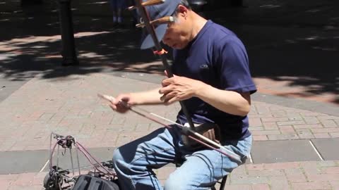 Fred Li Playing Erhu in Occidental Park in Seattle