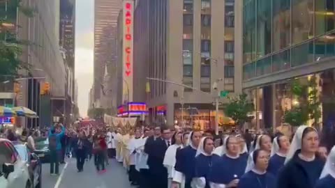 5,000 Catholics walked down the streets of New York City praying and singing for peace.