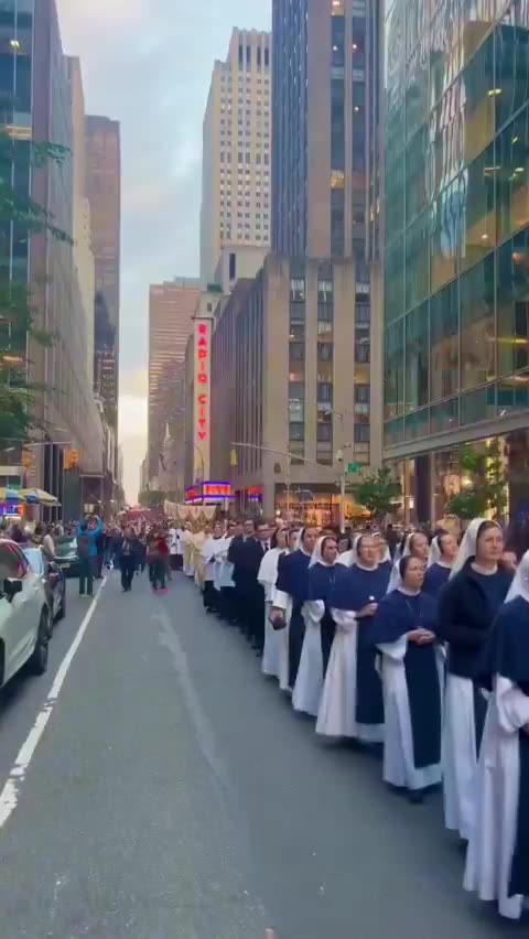 5,000 Catholics walked down the streets of New York City praying and singing for peace.