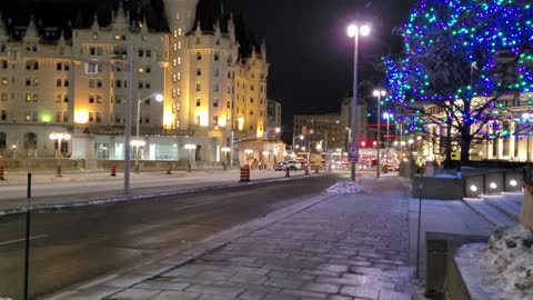 Canadian truckers tighten formation in front of Fairmont to prepare for government assault.