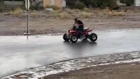 ATV Spinning on Wet Road