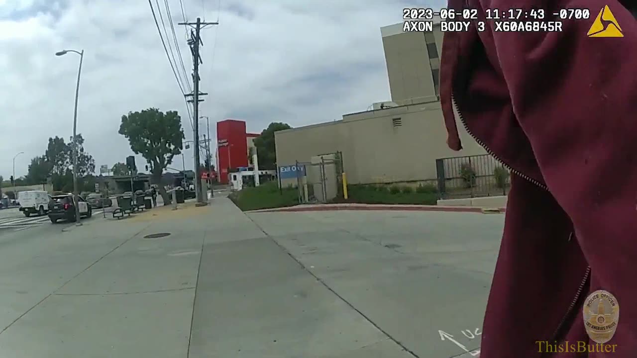 LAPD officers shoot suspect armed with a lawn edger with a bean bag shotgun before arresting him