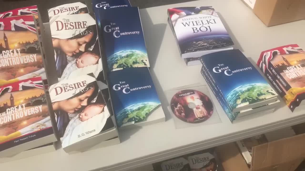 Giving out books at a Car Boot Sale in Wales